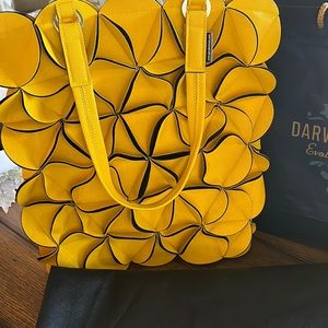 Yellow shoulder handbag. Purchased in Koblenz ,Germany from Darwin’s Daughter